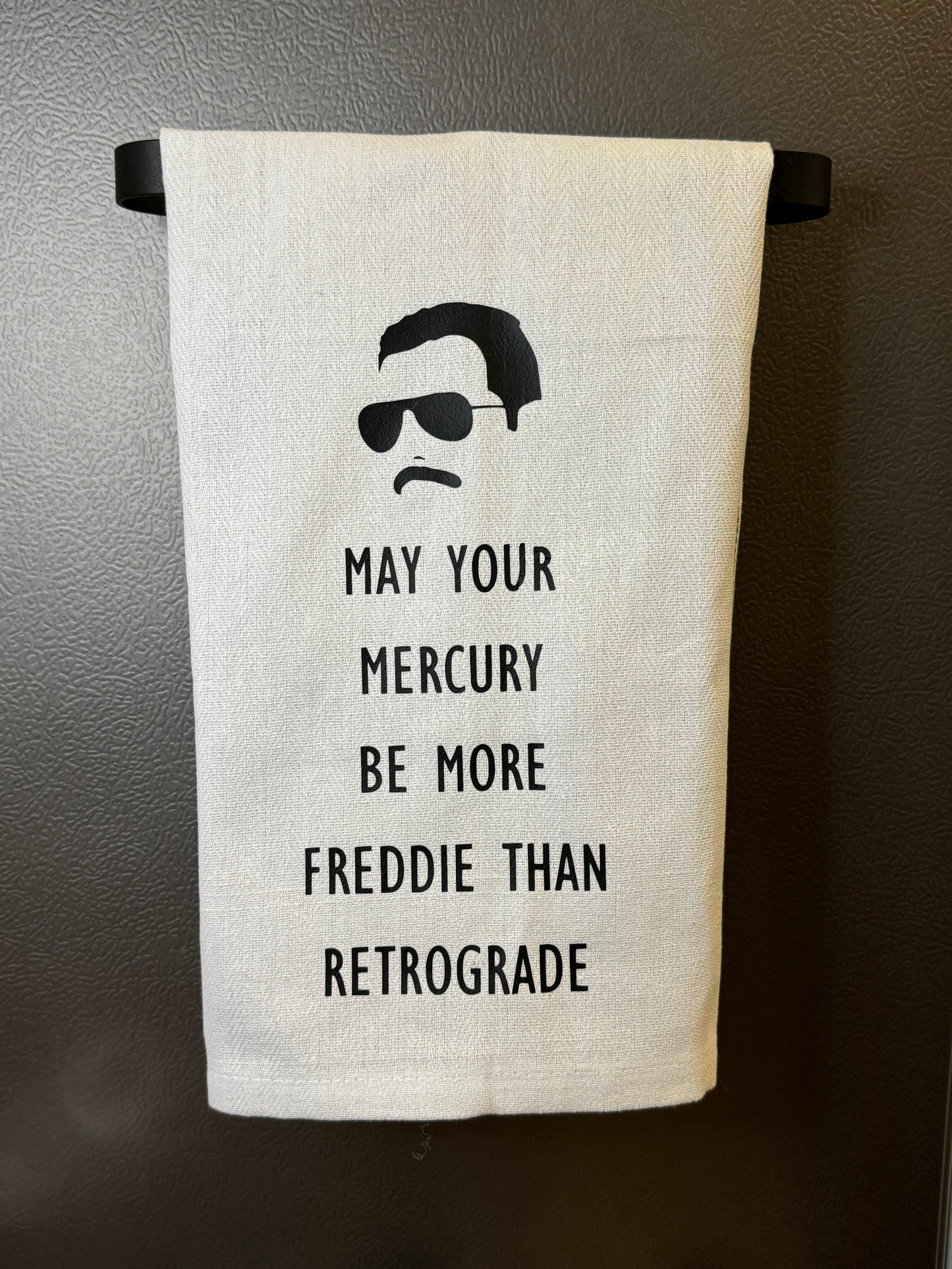 Freddie vs. Retrograde Mercury Tea Towel