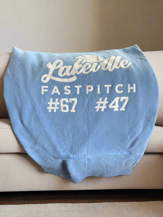 Carolina Blue Blanket with white glitter vinyl logo and numbers for custom blanket.